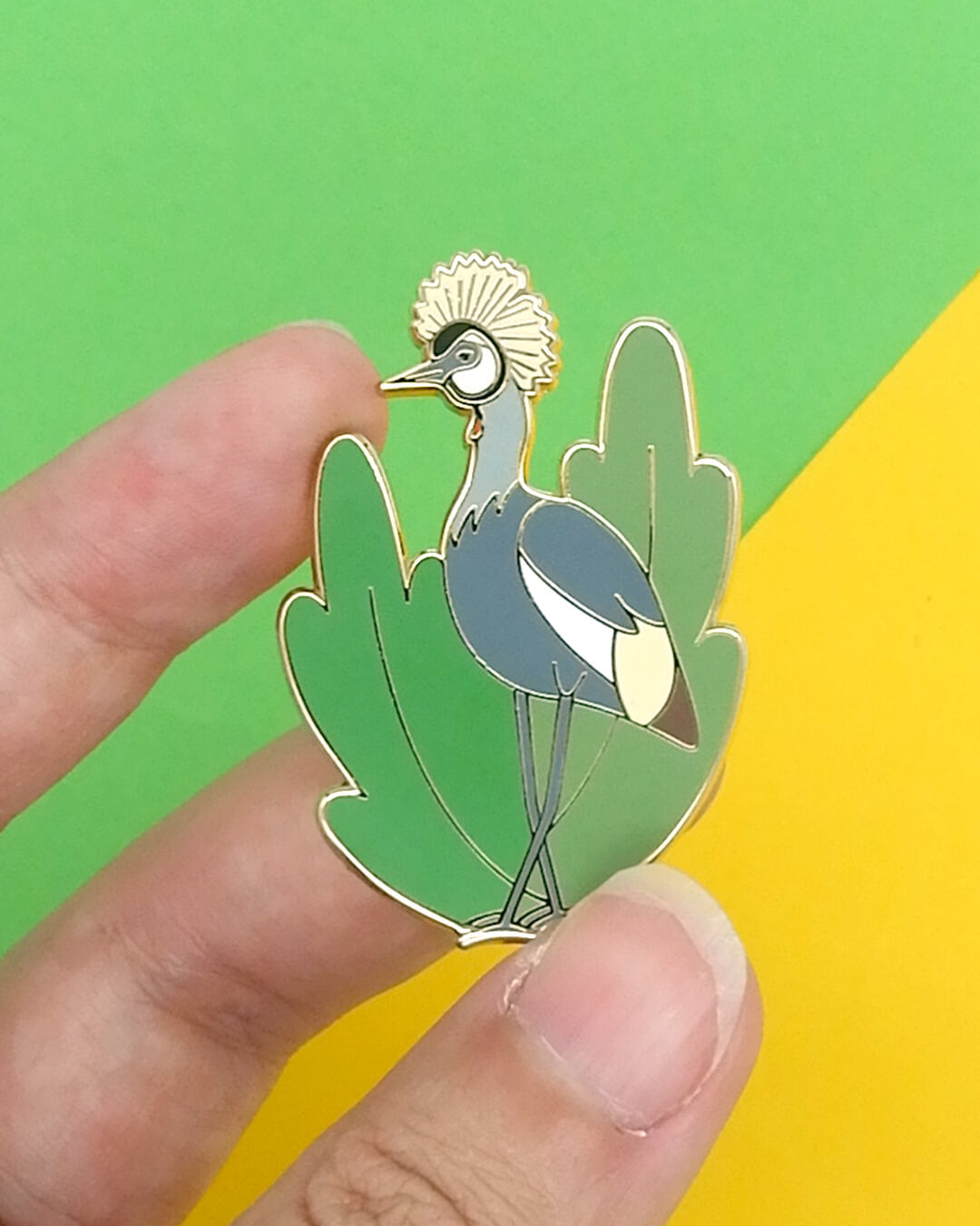 Grey crowned crane hard enamel pin